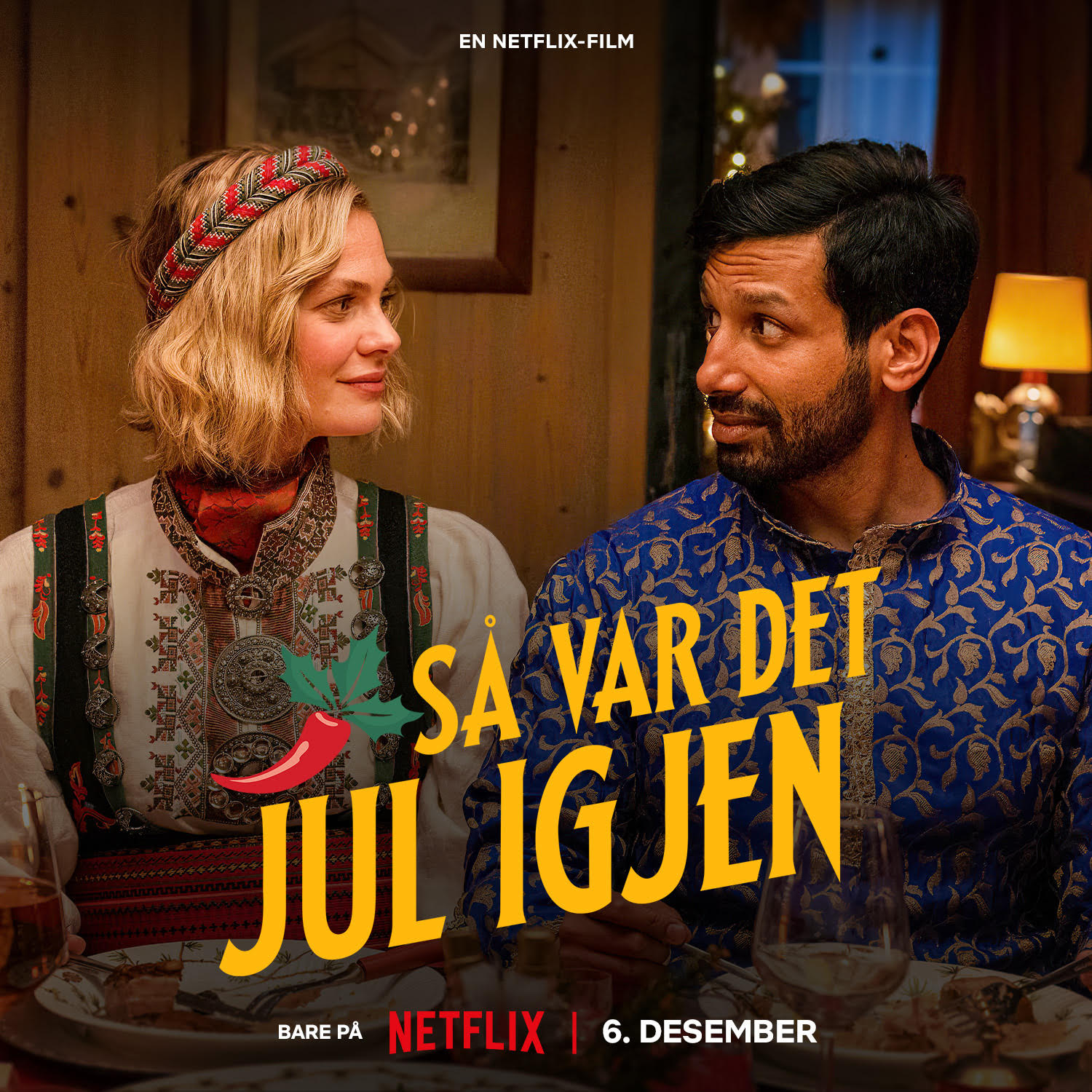 To personer i tradisjonelle klær ved et julebord. Tekst: Så var det jul igjen. Netflix 6. desember.