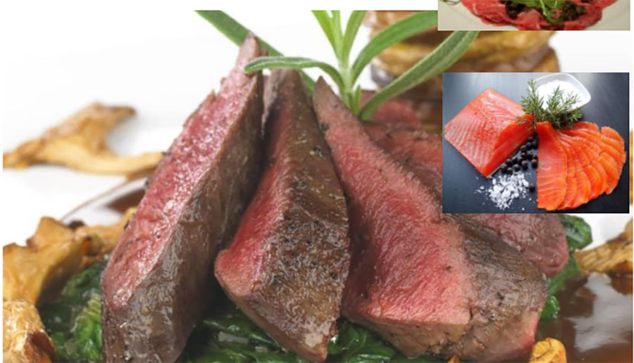 Bilde av perfekt tilberedt biff med tilbehør av gourmetfisk, sopp og grønt. Lekkert måltid klar til servering.