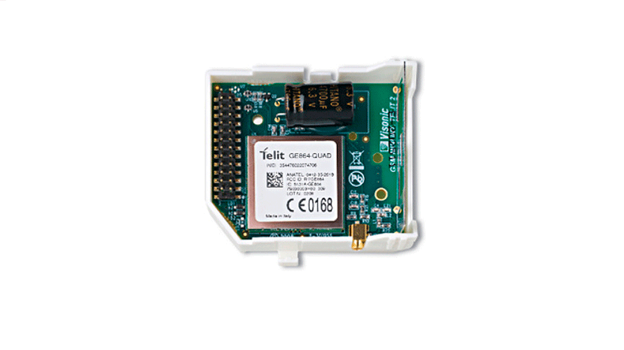 Elektronisk kretskort med Telit-komponent, merket GBE64 QUAD, for kommunikasjonsteknologi, mot hvit bakgrunn.