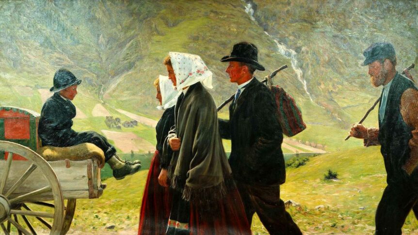 Mennesker på tur med fjell i bakgrunnen, landskap og kledde i tradisjonell norsk folkedrakt.