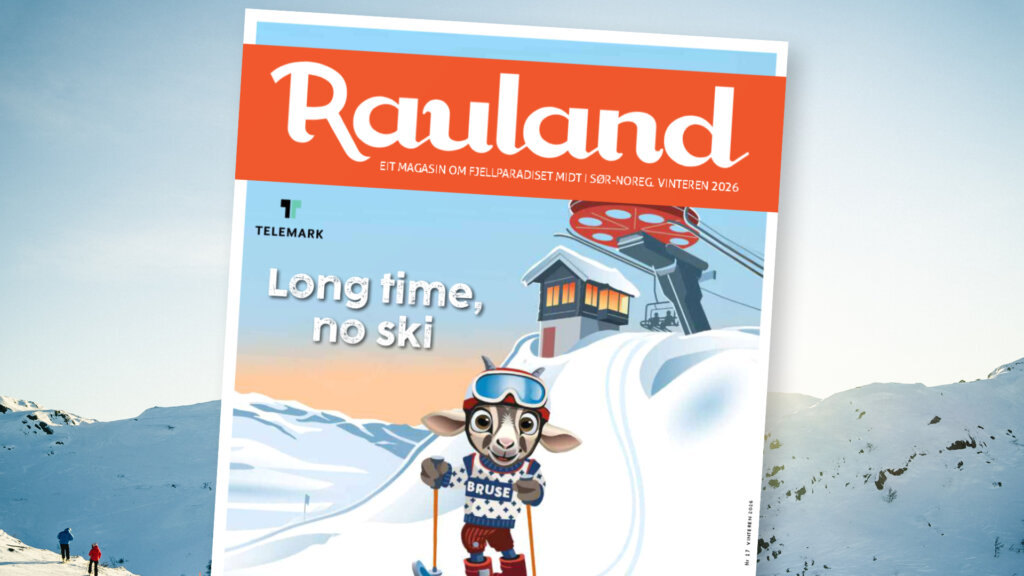 Bladet Rauland vinter 2026 med tegnet figur på ski og teksten Long time, no ski foran skiheis i snølandskap.